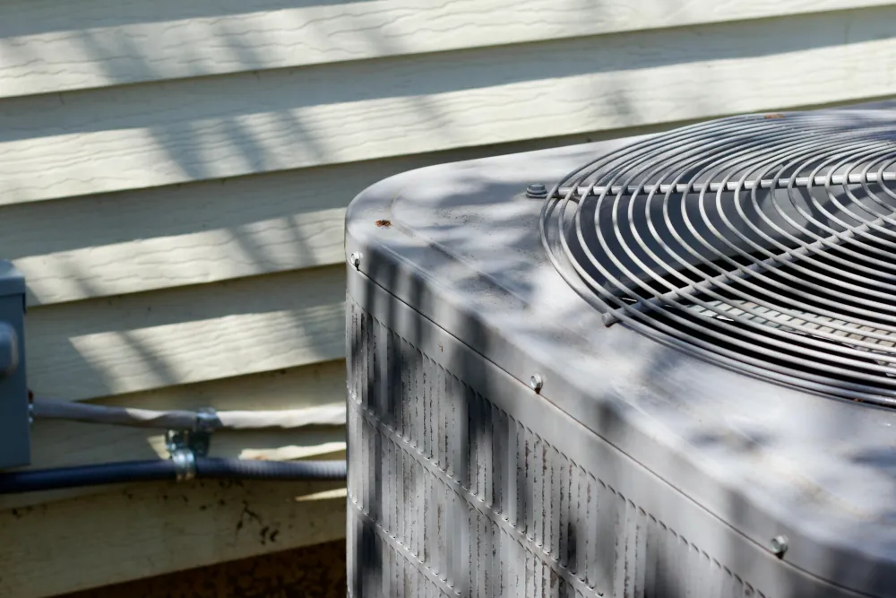 AC maintenance in Pueblo West before the weather changes - Picture of an HVAC unit. Close up.